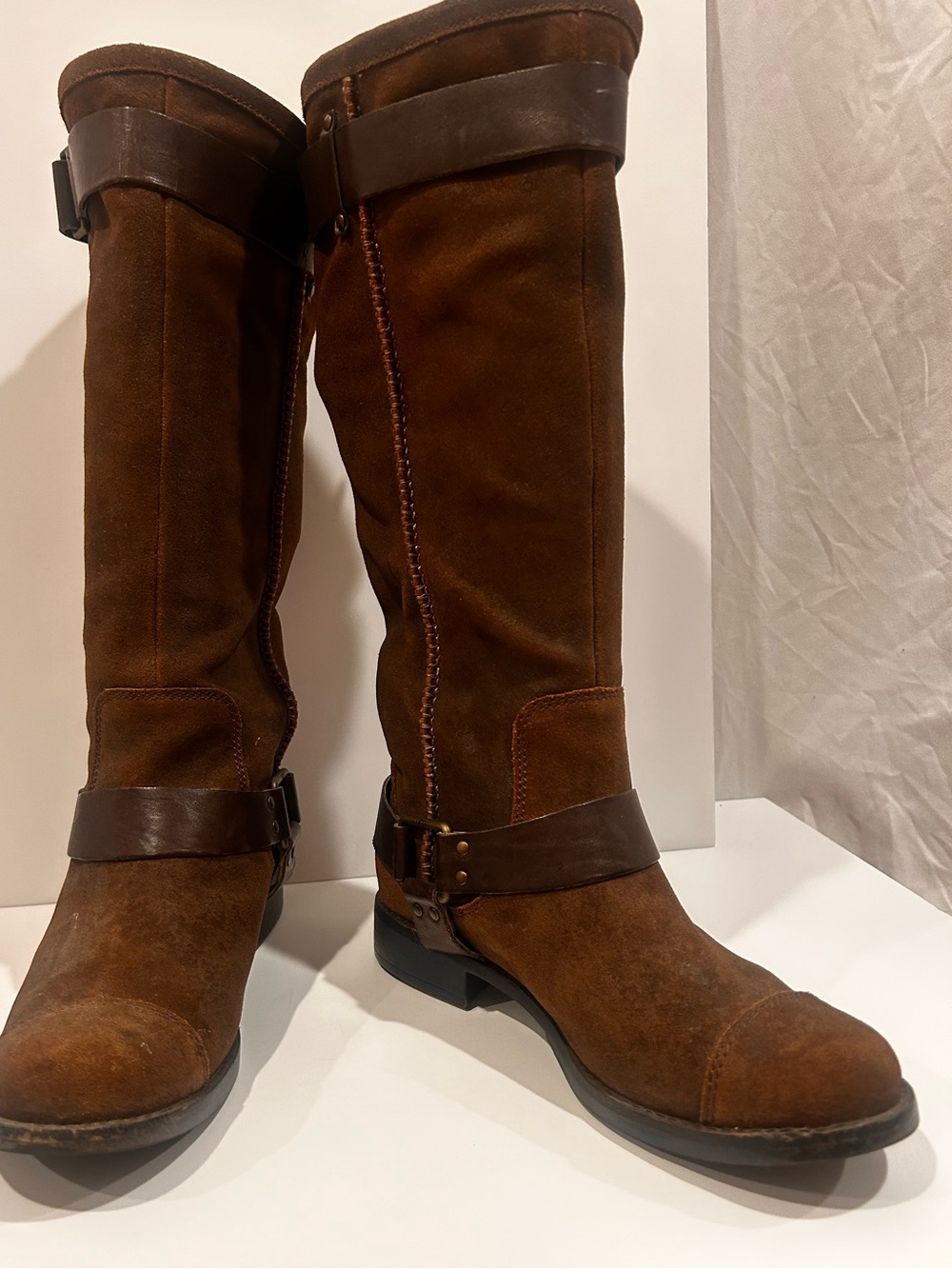 UGG Dree knee-high riding boots in a dark brown suede with harness strap